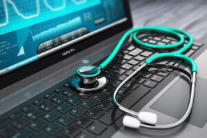 Natural Language Processing for Healthcare Blog Feature Image: A stethoscope sits on a computer keyboard