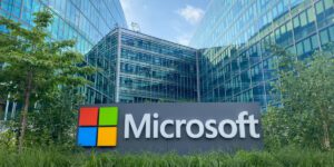 Microsoft headquarters sign outside office buildings, representing Microsoft Office security vulnerabilities.