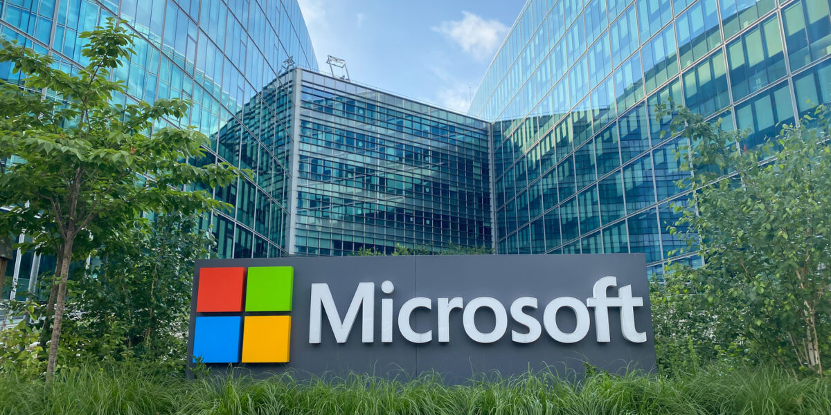 Microsoft headquarters sign outside office buildings, representing Microsoft Office security vulnerabilities.