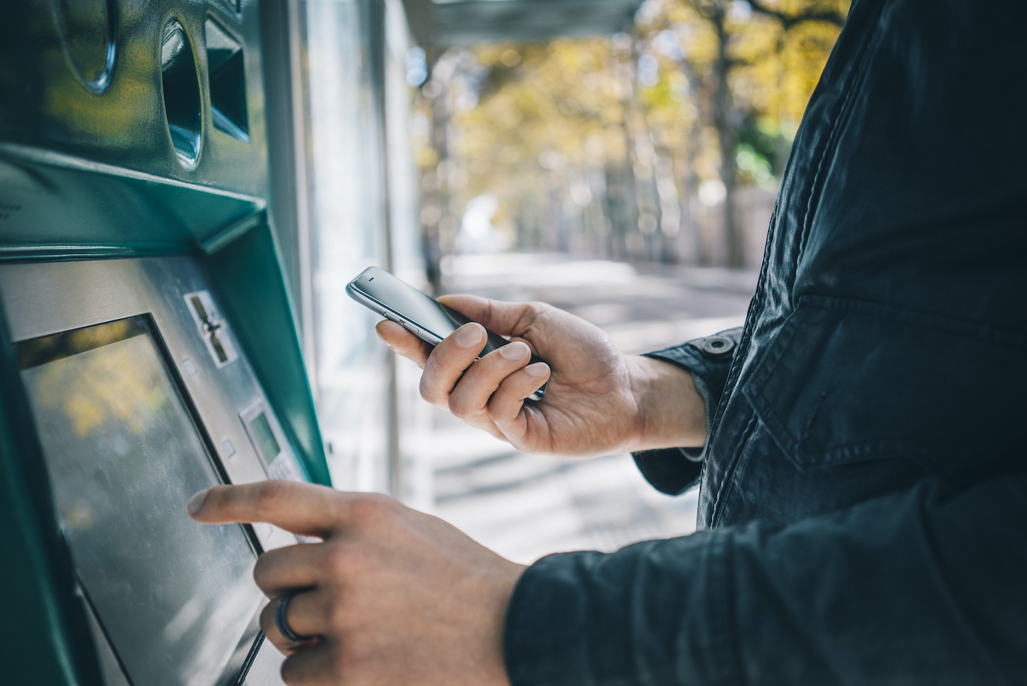 A person signs into their bank account at an ATM. Read the full blog to learn about the trends we’ve identified in Banking in 2022.