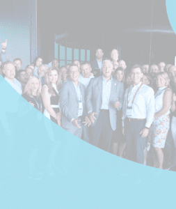 Current Open Positions at Quisitive Header. Mike Reinhart, CEO, and Quisitive pose smiling at a conference