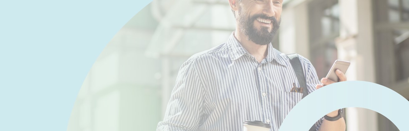 powergov header image - a man on his phone walks down the street smiling