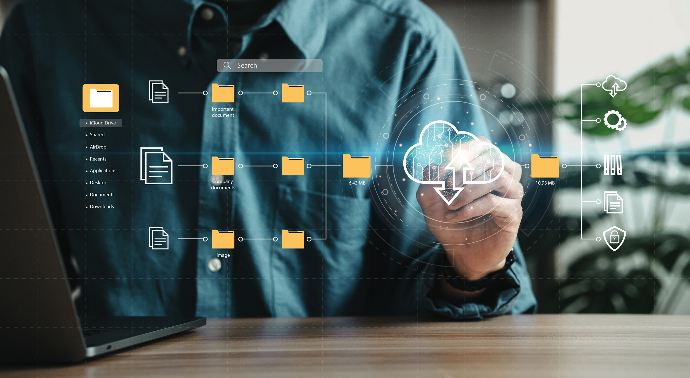 Hand moving digital folders to the cloud,