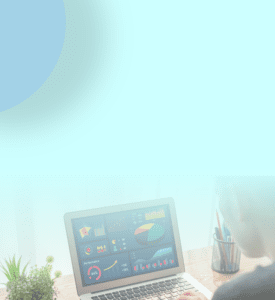 Data and Analytics Mobile header Image: A Man on a computer reads over data charts and stats