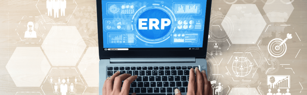 Hands hover over a computer keyboard that says ERP, Dynamics AX to Dynamics 365 migration image