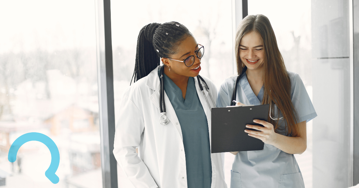 Digital Transformation New Feature Image - Two health care workers discuss