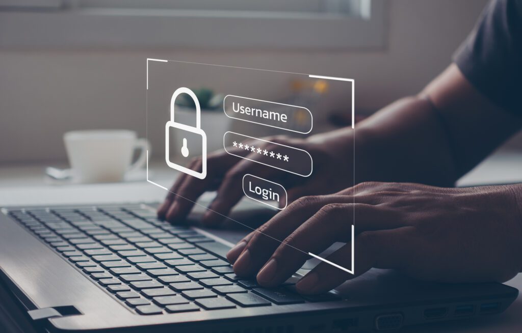 Hands typing on a keyboard with the lock and log-in form in the middle.