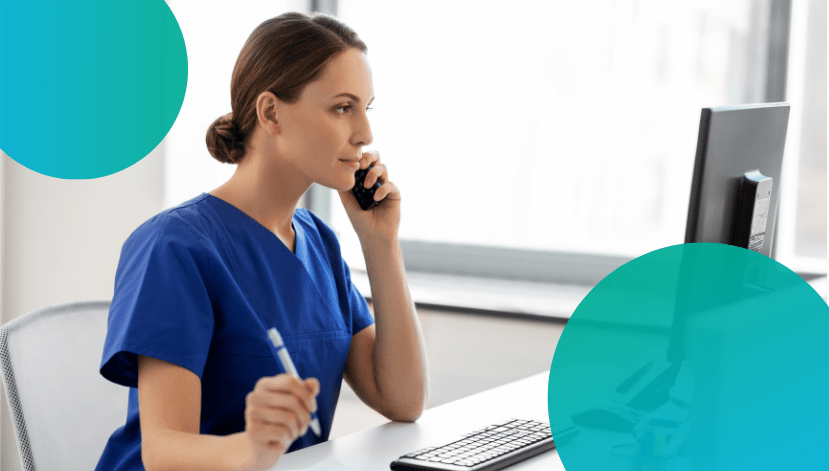 Blog Feature Image 8 Steps to Building the Perfect Healthcare Contact Center: A woman in nurse's scrubs talking on a phone and sitting at a computer while on a call with a patient