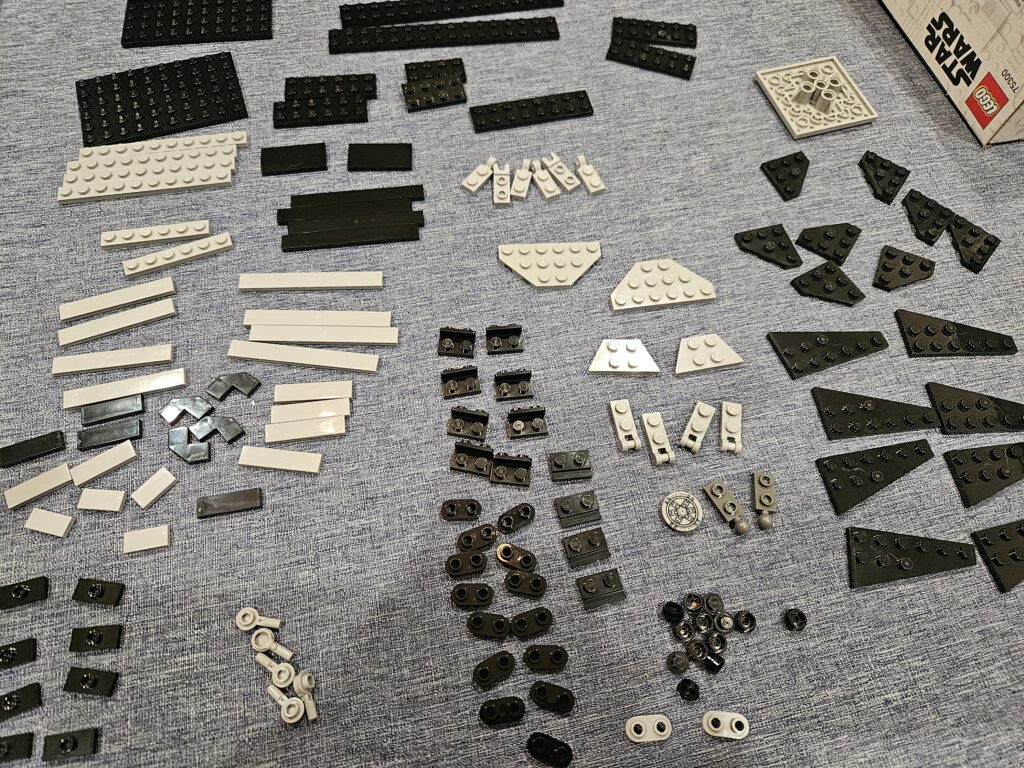 Blog Image - Legos and Azure Monitoring - Organized parts from the Lego Tie Fighter, pre-build