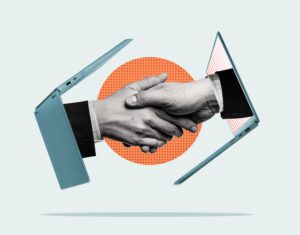 Top Microsoft Managed Services Providers Blog Feature Image - 2 hands coming out of laptop screens shake hands, representing a partnership